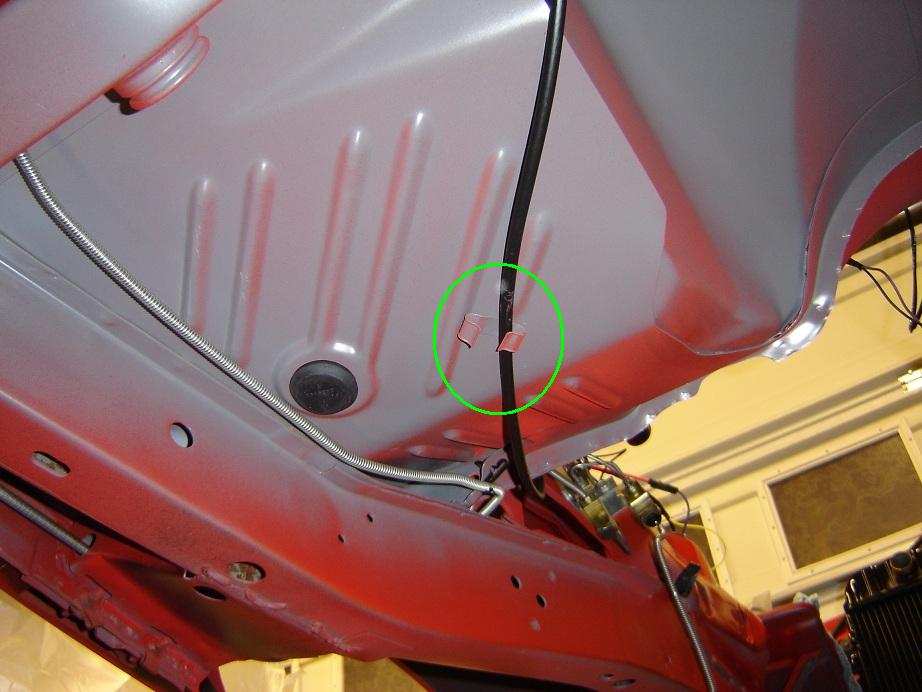 speedometer cable bracket on floorpan AAR 2.JPG